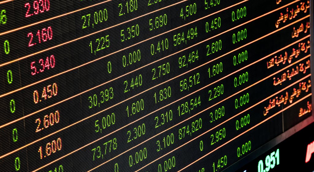 Stock market screen with ticker data, illustrating what is an ETF
