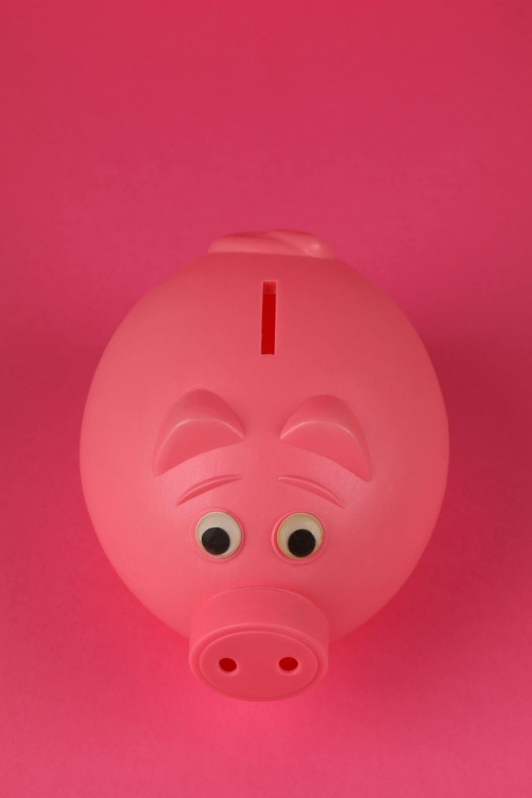 Pink piggy bank illustrating what are CDs and how a certificate of deposit grows your savings